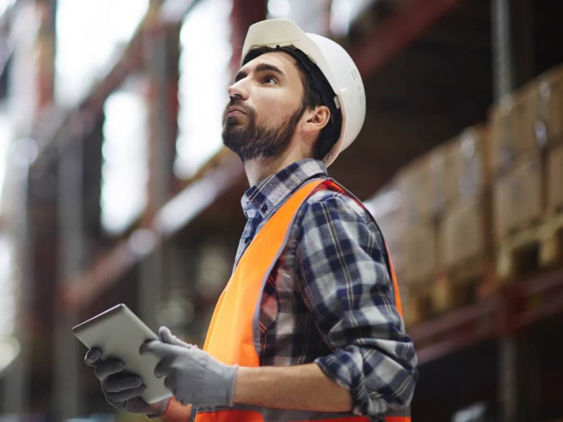 man inspecting site