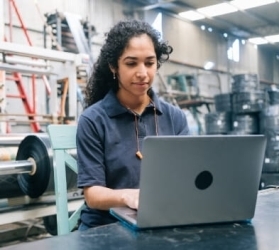 Engineer at Pro-Seal working on a laptop