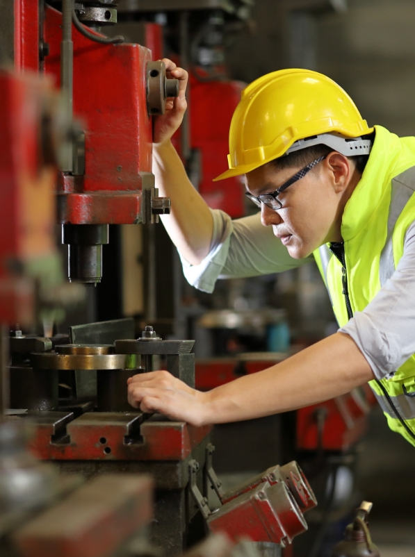 Pro-Seal employee working with industrial equipment